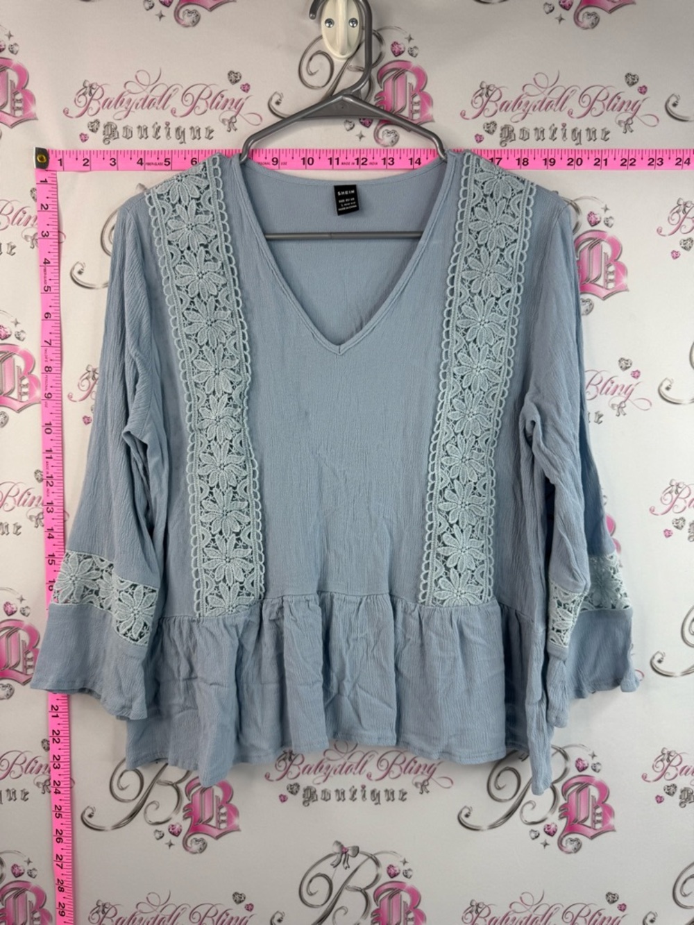 SHEIN V-Neck Crochet Panel Peplum Tunic Light Blue with a floral panel